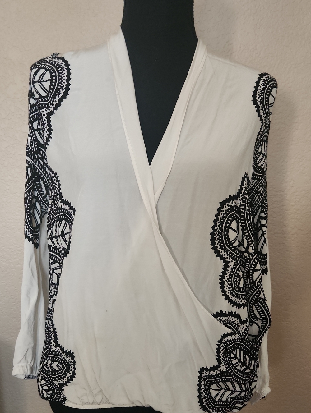 White Wrap-Front Blouse with Black Lace Trim